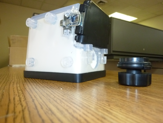 Release both (left and right) toggle latches from the catch plates in order to remove the front