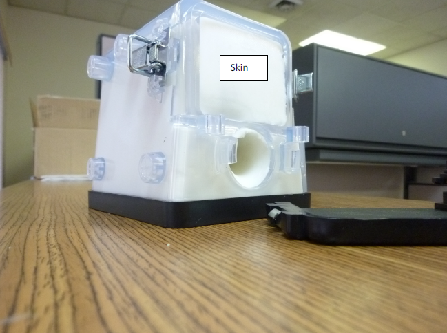 Remove the front window, to discover the skin component behind it.